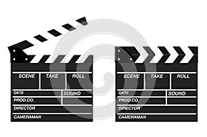 Two movie clappers open and close isolated on white background.