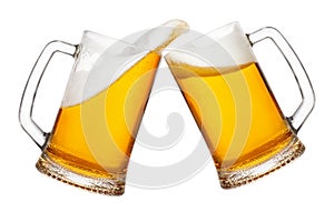 Two mugs of beer with splash