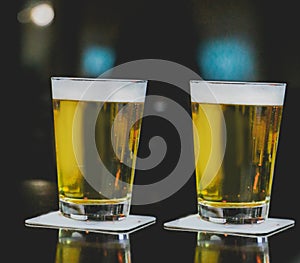 Two mugs of Chopp on the table