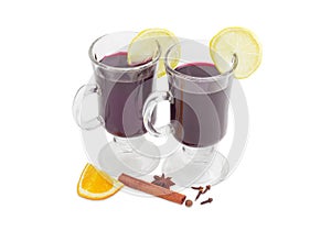 Two mugs with mulled wine and slices of lemon