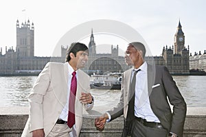 Two multi ethnic businessmen having a conversation
