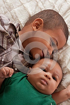 Two multiethnic boys brothers (focus on baby)