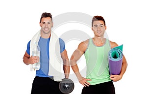 Two muscular men with gym equipment