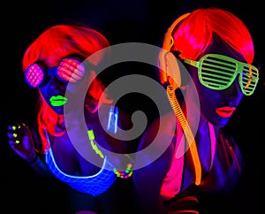 Two neon uv glow dancers