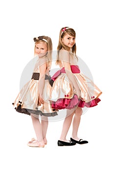 Two nice little girls in a dress