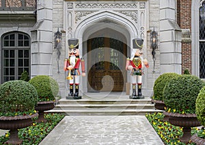 Two Nutcrackers guarding the door of a mansion in Highland Park at Christmas in Dallas County, Texas photo