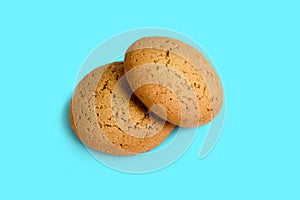 Two oatmeal Cookies on white background