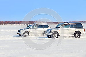 Two off road SUVs racing