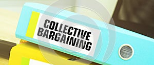 Two office folders with text COLLECTIVE BARGAINING