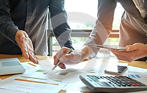 Two office workers are analyzing data,Business concepts.