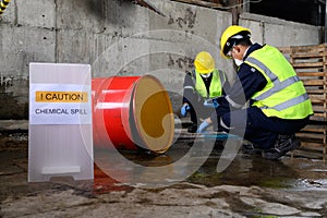 Two Officers of Environmental Engineering wearing masks inspected Oil Spill