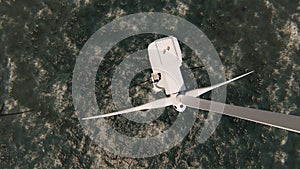 Two offshore workers on the top of the windmill, wind farm