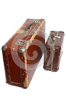 Two old brown fiberboard suitcases photo