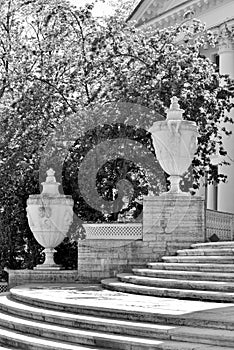 Two old decorative vases on the stairs of the Elagin Palace