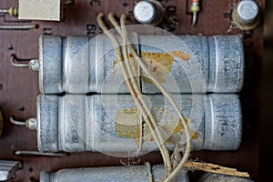 Two old gray dirty metal electrical resistors