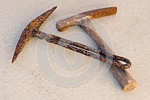 Two old iron rusted mining picks