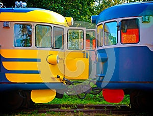 Two old locomotive parked on railroad tracks