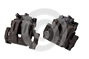 Two old metal brake caliper on a white background in a photo studio for replacement during the repair of the chassis or for a