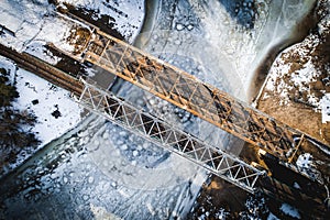 Two, old and new railway bridges in winter. Top view, Drone photo.