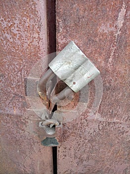 Two old padlocks on  doors