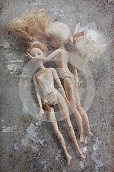 Two old plastic dolls