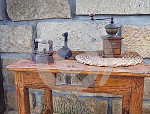 Two old rusty antique iron with wooden handle, hand coffee grind