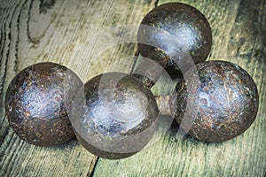 Two old rusty dumbbell