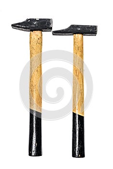 Two old, used hammers isolated on a white background