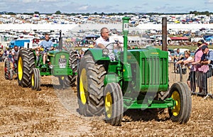Two old vintage John Deere Tractors at show