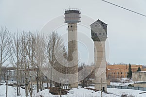 Two old water towers of Soviet era