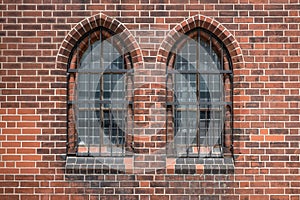 Two old windows , gothic church building exterior