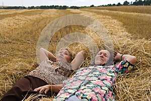 Two old women on field