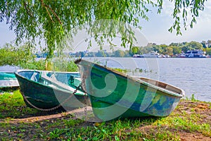 Two old wooden boats on the shore