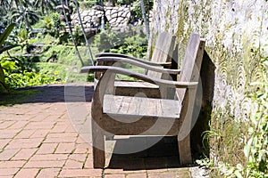 Two old wooden chairs in tropical garden for relaxing on nature , Island Bali, Indonesia. Closeup