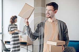 Two online shop employees handling their daily tasks