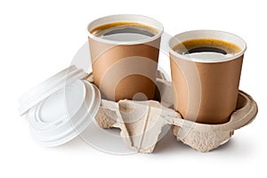 Two opened take-out coffee in holder