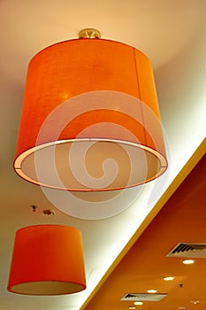 Two Orange Designer Lamps