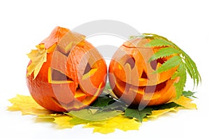 Two orange halloween pumpkins Jack O Lanterns