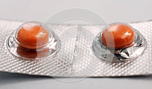 Two Orange pills