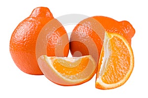Two orange tangerine or Mineola with slices isolated on white background