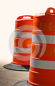 Two Orange Traffic Barrels