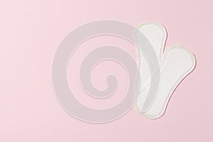 Two pads on a pink background. Ovulation concept. menstruation concept