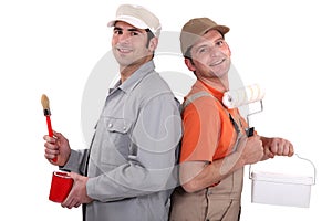 Two painters back to back