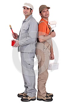 Two painters back to back