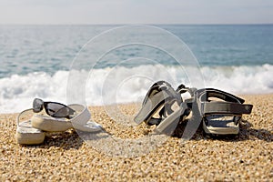 Two pairs of beach shoes