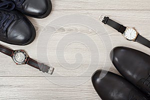 Two pairs of black leather men`s shoes and two wristwatches