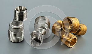 Two pairs of eccentrics connectors in brass and stainless steel.