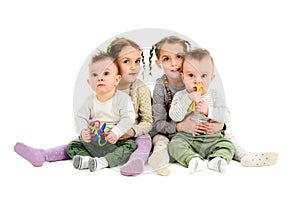 Two pairs, sets of twins - boys and girls.