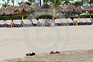 Two pairs of shoes on the beach Puerto Vallarta