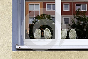 Two pairs of shoes in a window, Berlin, Germany